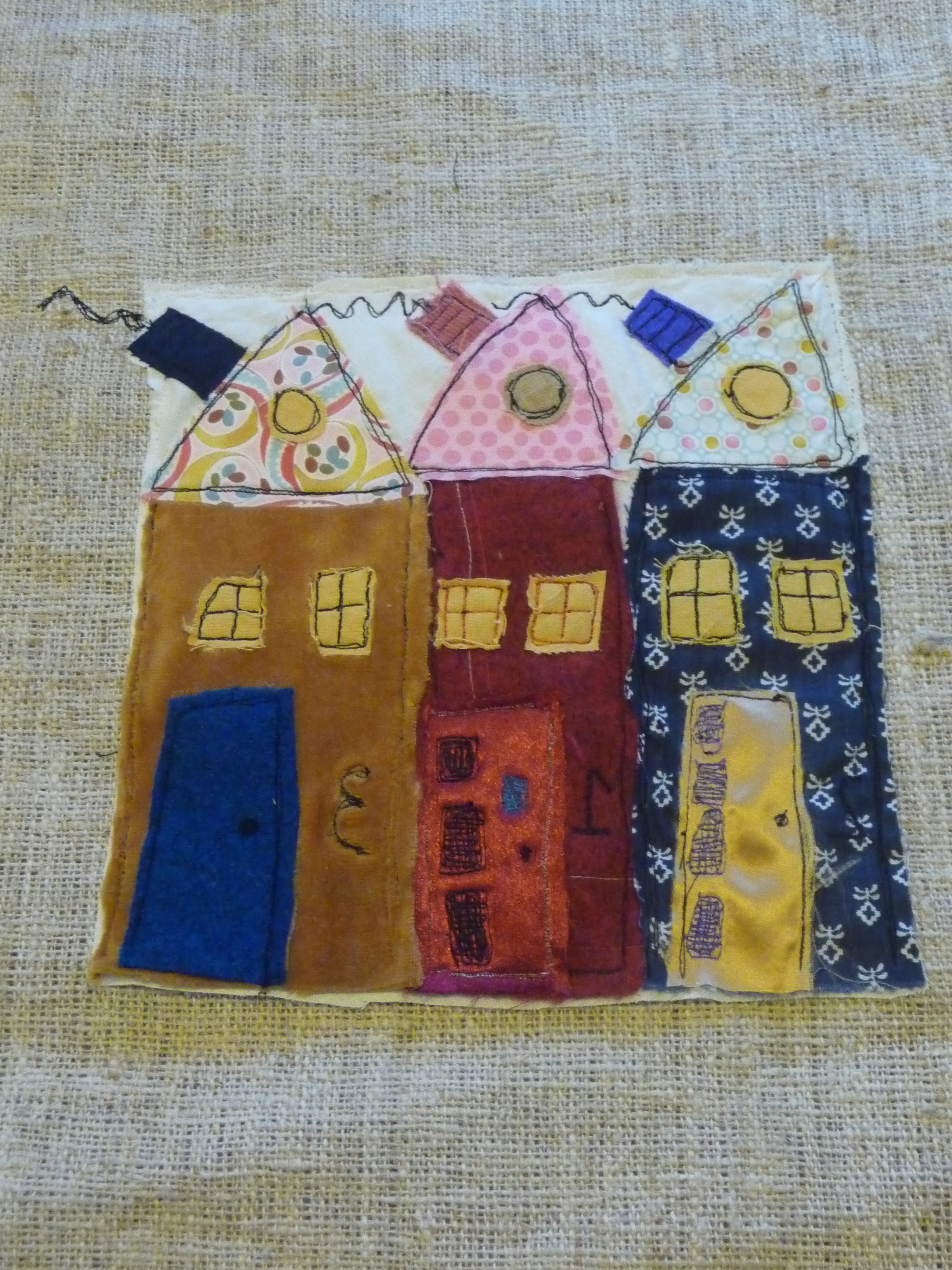 'Look Mommy, there is our house' Free style embroidery classes in Stroud Textile and Sewing classes, make your own Skirt, embroidery, creative needle work, hairband with dried flowers, Cotswold, organza fabric, sequins, wrap around skirt, sewing classes, textile workshops, learn to sew, making clothes, free hand embroidery, Cotswold, sequins, wrap around skirt, sewing classes, textile workshops, learn to know your sewing machine, up-cycle clothes and create a new wardrobe, making a bag using recycled fabric