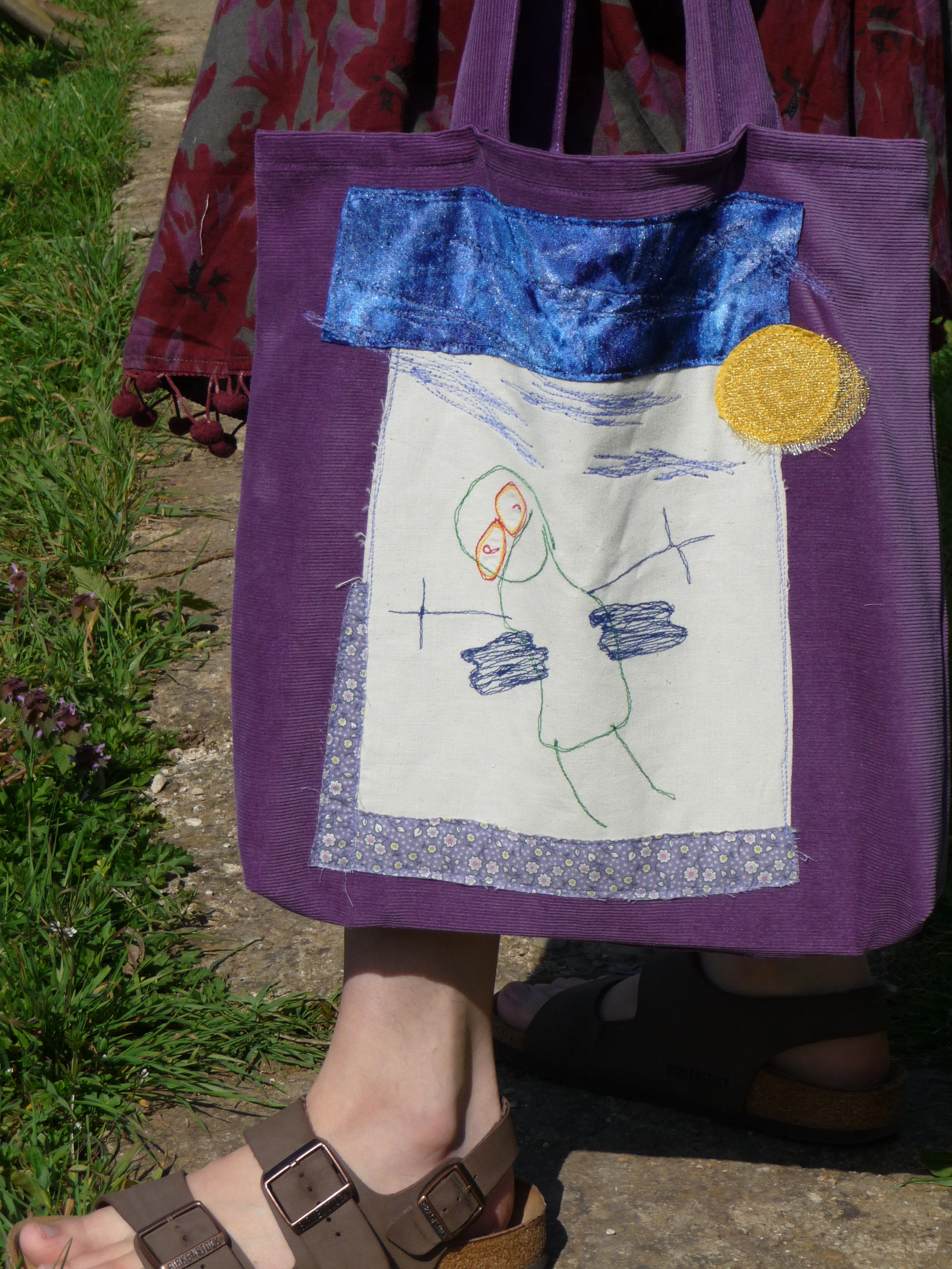 Embroidery based on your kids drawings. Make clothes for your kids, make your own childrens clothes Free style embroidery classes in Stroud, make your own Skirt, embroidery, hairband with dried flowers, Cotswold, organza fabric, sequins, wrap around skirt, learn to sew, making clothes, free hand embroidery, Cotswold, sequins, wrap around skirt, sewing classes, textile workshops, learn to know your sewing machine, up-cycle clothes and create a new wardrobe, making a bag using recycled fabric